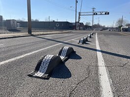 Recycled tires serve as art and safety features along Broad Ave. bike lanes. (submitted)