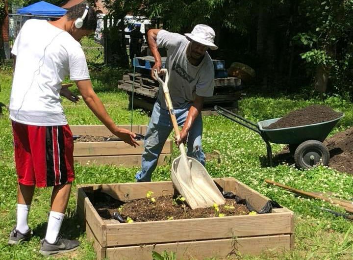 Volunteers plant a garden as part of a cleanup effort organized by Klondike Smokey City CDC and supported by Hope City Church. (Submitted)