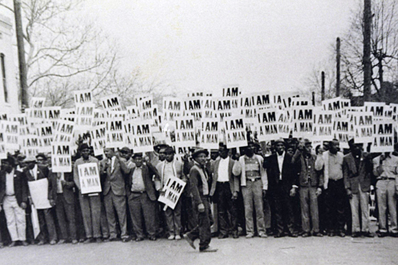 The 1968 sanitation workers’ on strike hold up "I Am A Man" signs in protest of their treatment by the city.