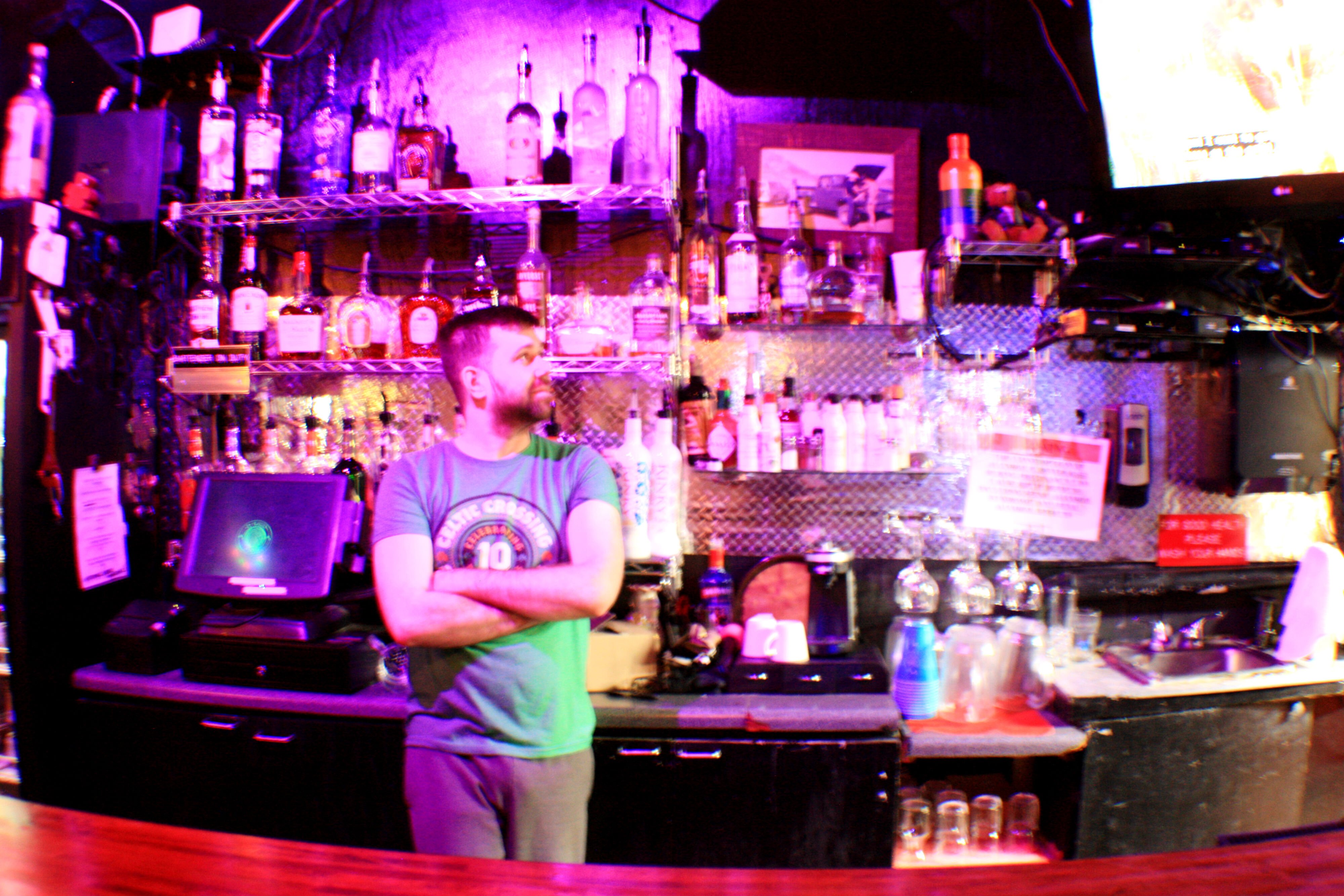 A local bartender stands alone at his station. Many Memphis bars and restaurants are already closing to control the spread of COVID-19. Many more are expected to close with the possibility of a city- or statewide shutdown. (Cole Bradley) 