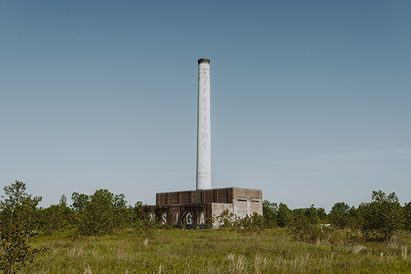 The white smokestack of the former Firestone plant in North Memphis. (Houston Cofield)
