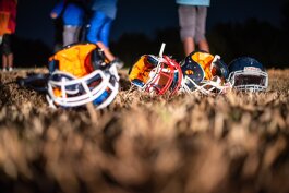 Ridgeway Cougars helmets rest in the grass during practice. (Malik Martin)