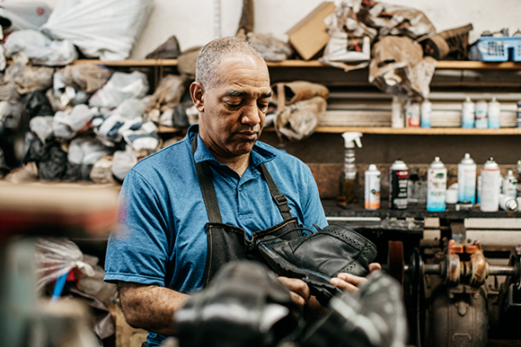 Alvin Hooper, owner of Nu-Life Shoe Repair, started in the shoe business right after graduating high school.