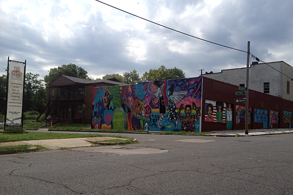 A mural was painted on an abandoned building across from the pocket park on Wellington.