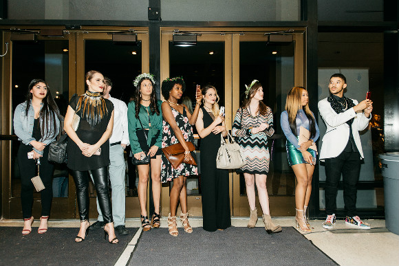 Guests study the runway at Memphis College of Art for the second night of Memphis Fashion Week.