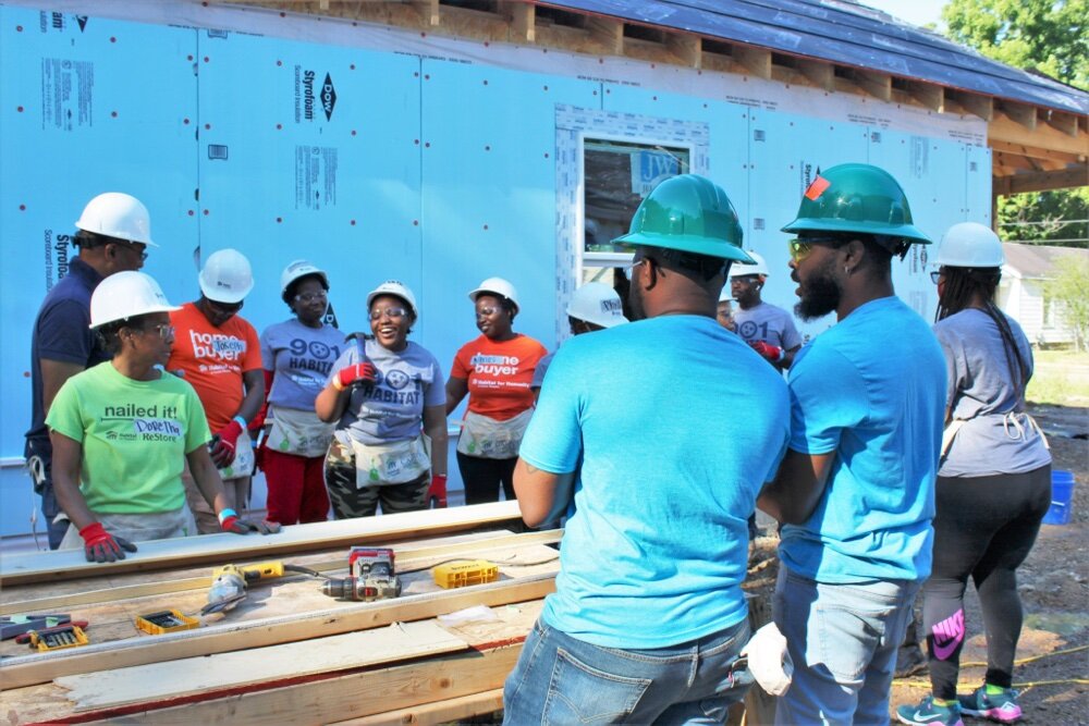 Volunteers gather to build six new homes in North Memphis earlier this June.