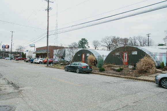 The east side of Flicker Street is lined with mid-century Quonset huts.