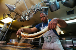 Daniel Watson prepares cinnamon rolls in his South Memphis commercial kitchen.