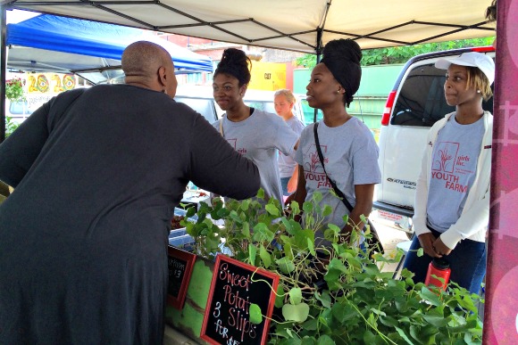 Girls Inc. Frayser Youth Farm girls sell produce at the Memphis Farmers Market