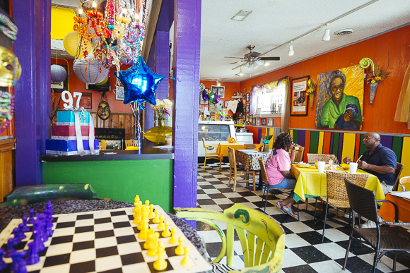 Customers dine at the Pinch District's Alcenia's soul food restaurant. The restaurant has been featured on Food Network and Chopped. (Ziggy Mack)