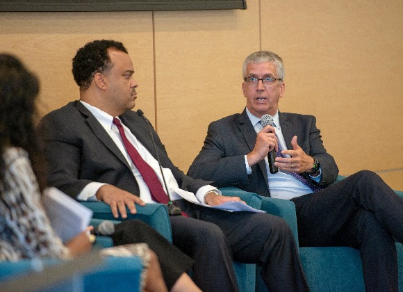 Dr. Christopher Herbert (with microphone), managing director of the Joint Center for Housing Studies at Harvard. To the left is David Bowers, vice president and mid-Atlantic market leader at Enterprise Community Partners Inc. The pair joined other ex