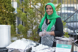 Ibtisam Salih sells Sudanese fare at the Caritas on Broad pop-up shop at the 10th annual Broad Avenue Art Walk. 