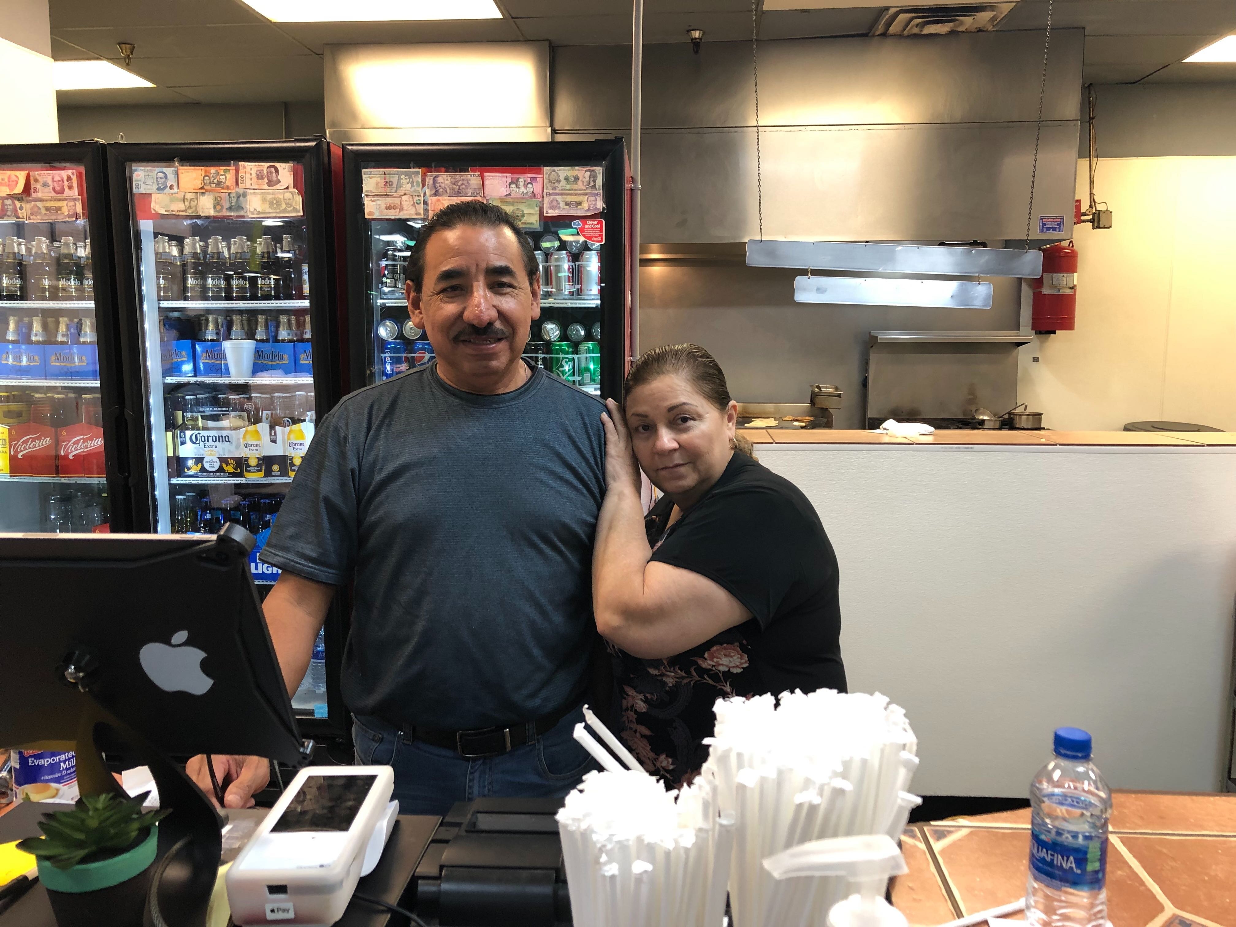 Juan Antonio Hernandez, owner of El Nuevo Mercadito, poses with his wife, Norma Mendoza, at the restaurant's counter. El Nuevo Mercadito is a Mexican restaurant located inside the El Mercadito de Memphis in Hickory Hill. (A.J. Dugger)