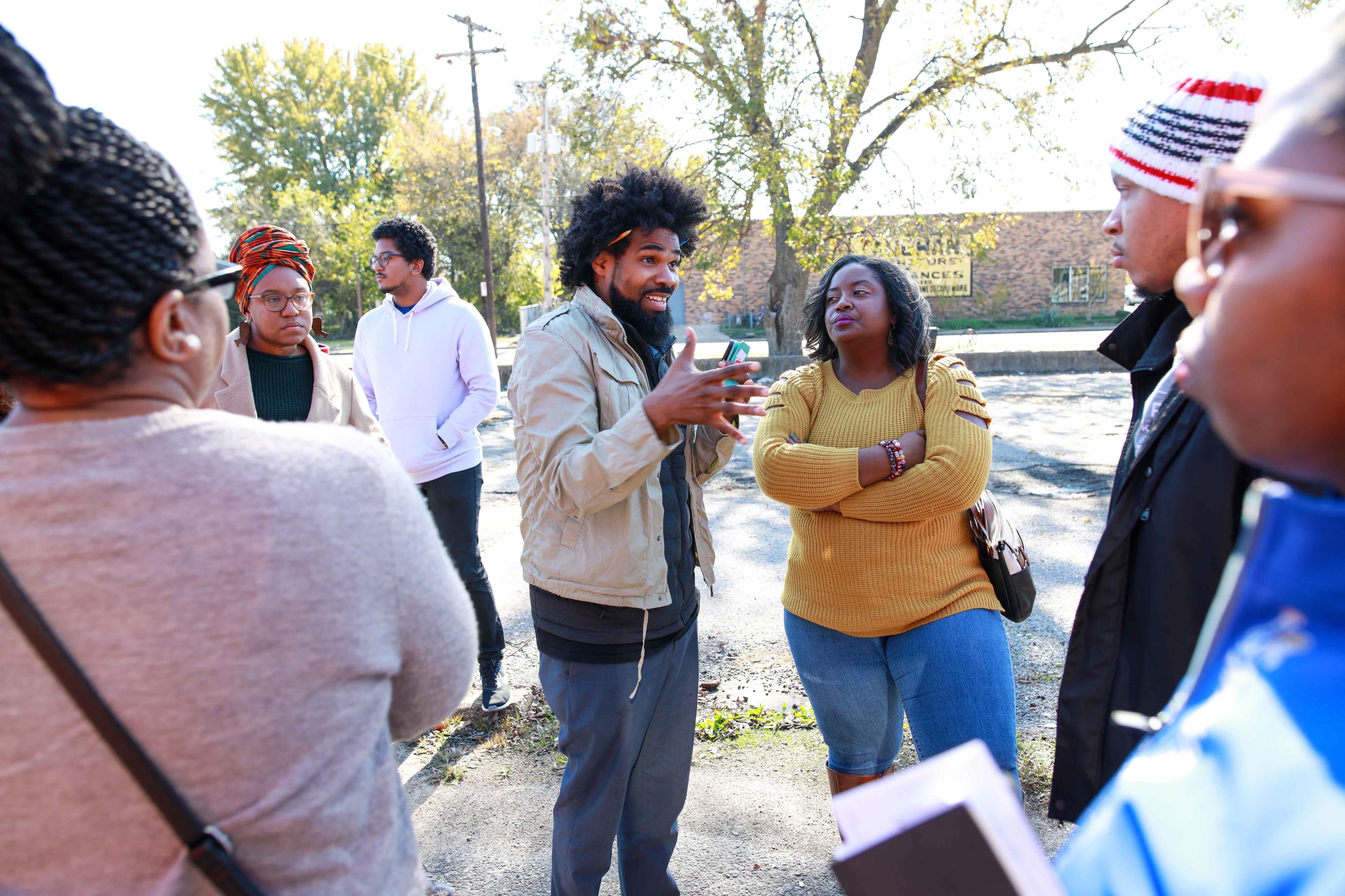 Justin Merrick (center) is executive director for the Center for Transforming Communities. CTC is assuming local operation of national resource partner, SPARCC., Center for Transforming Communities)  