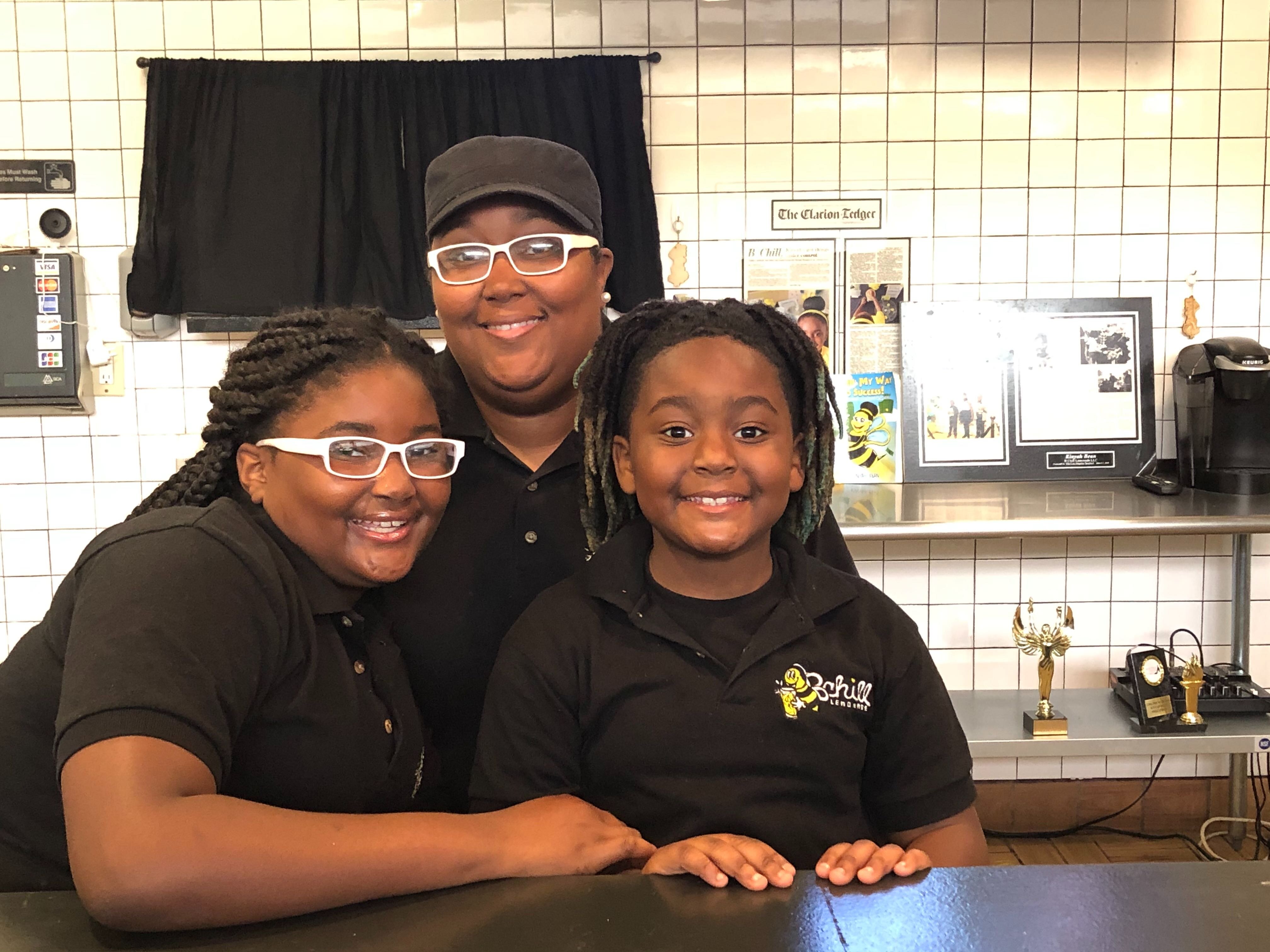 L to R: Kinyah Bean, Valerie Braddock and Demetrius Braddock Jr. Bean is the owner of B Chill Lemonade, located inside the former Hickory Ridge Mall. (A.J. Dugger III)