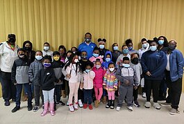 A group of Memphis Shelby PAL youth pose for a photo during the novel coronavirus pandemic. Founder Craig Little stands at the back center. (Submitted)