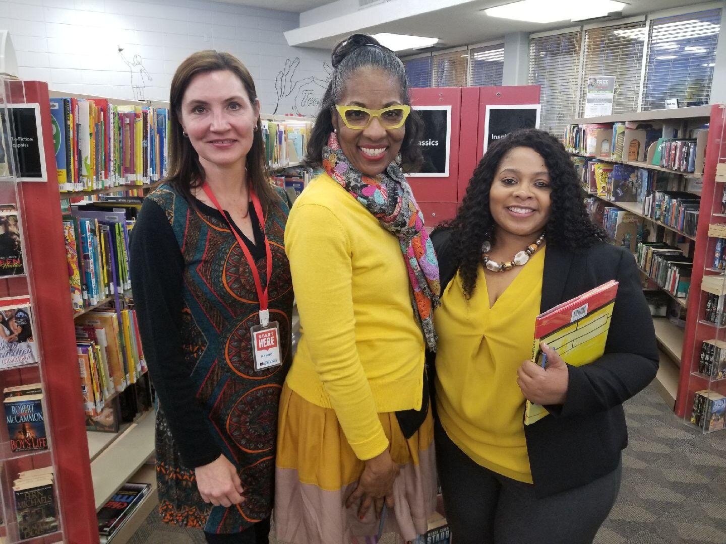 Director of Libraries Keenon McCloy, author Alice Faye Duncan, and Frayser Branch Manager Nakia Armstrong. The author held a reading and giveaway of her book where branch staff handed out LifeBridge applications. (Monique Rials) 