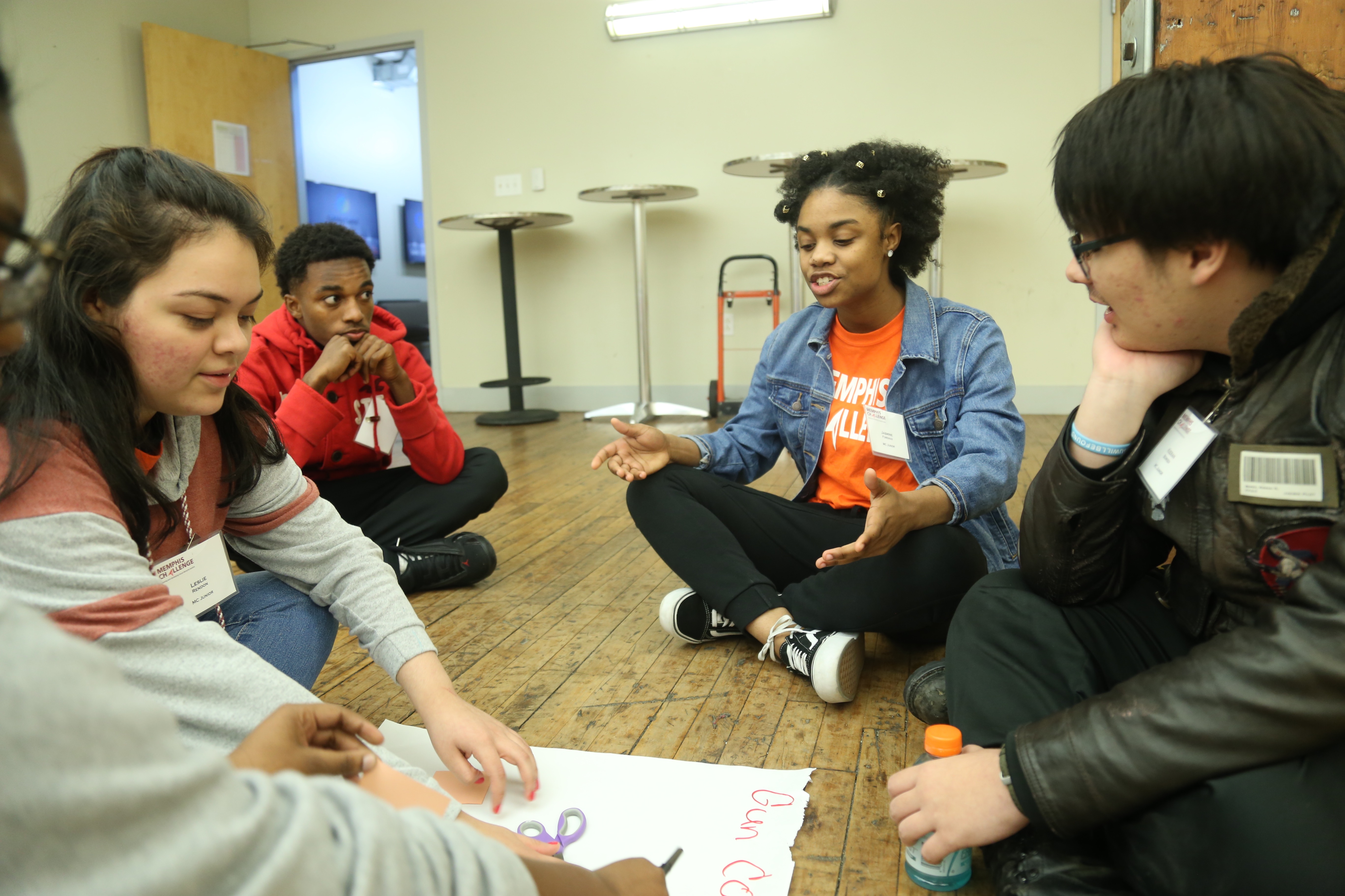 Junior Challengers are seen participating in a team building activity at their November 2018 workshop centered around what it means to be politically engaged as a teen in their community. (Submitted)
