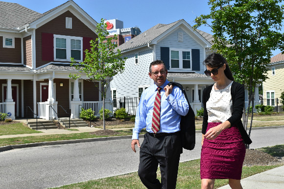 THDA executive director Ralph M. Perrey and THDA West Tennessee liaison Amy Schaftlein in Legends Park in the 38105 ZIP code, which qualifies for the down payment assistance fund.