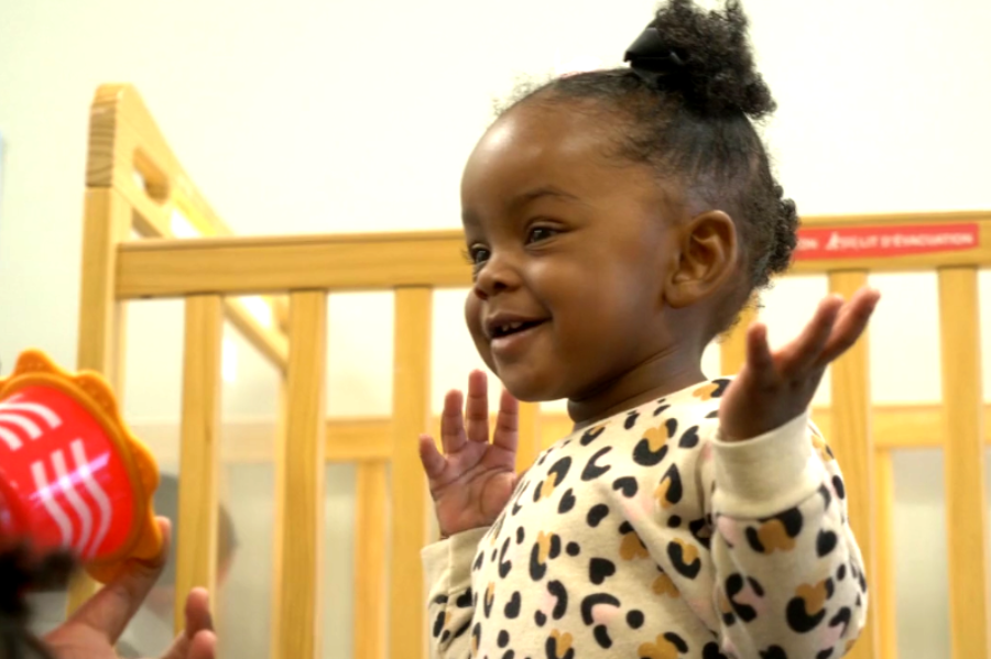 A toddler at the Porter-Leath Early Childhood Academy talks with her teacher. She's part of LENA Grow, which trains early childhood educators to build their students' conversation skills as a way to improve long-term learning success. (Forever Ready)