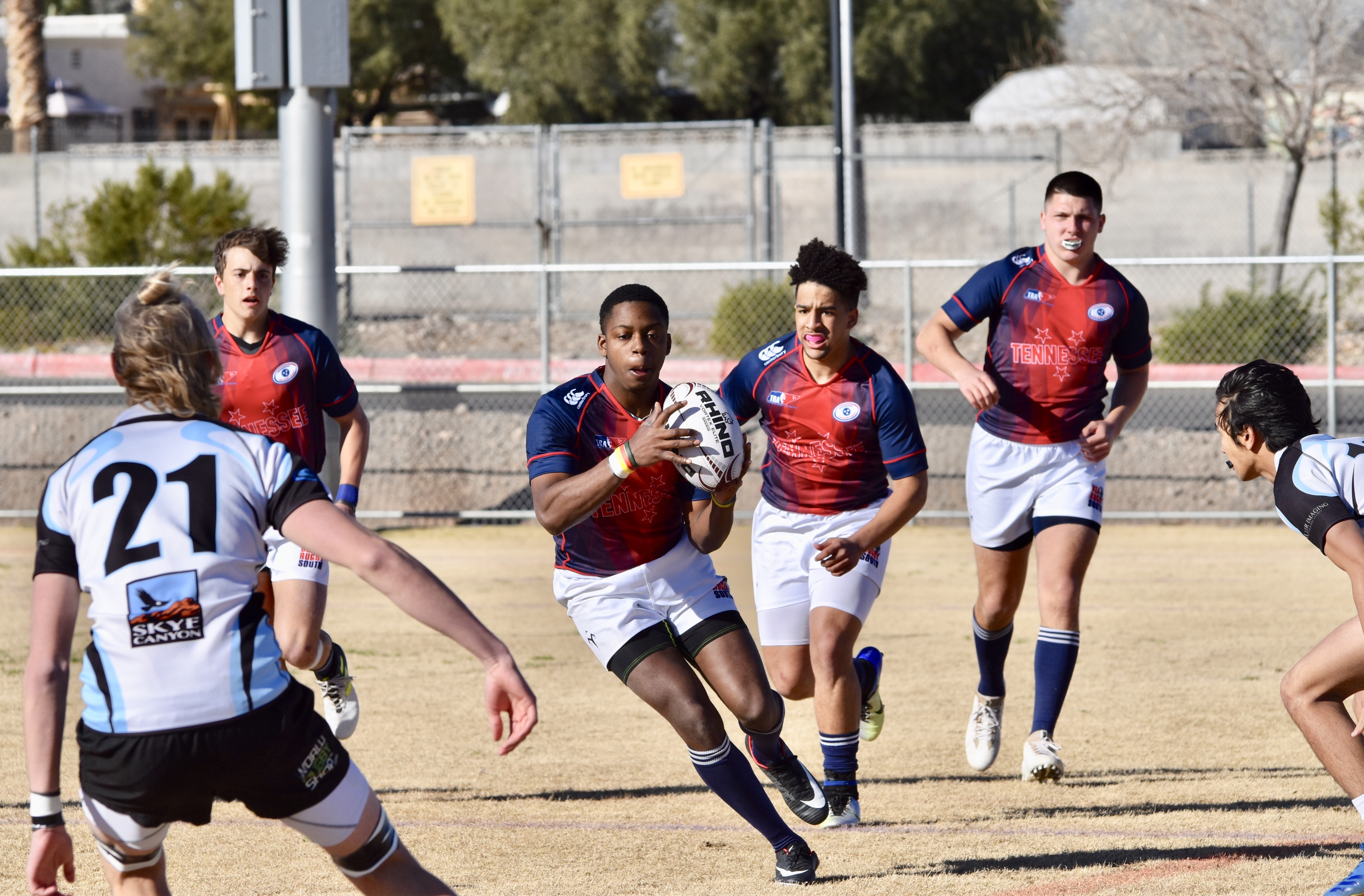 Leroy Taylor (Center) of Power Center Academy plays with Memphis Inner-City Rugby.