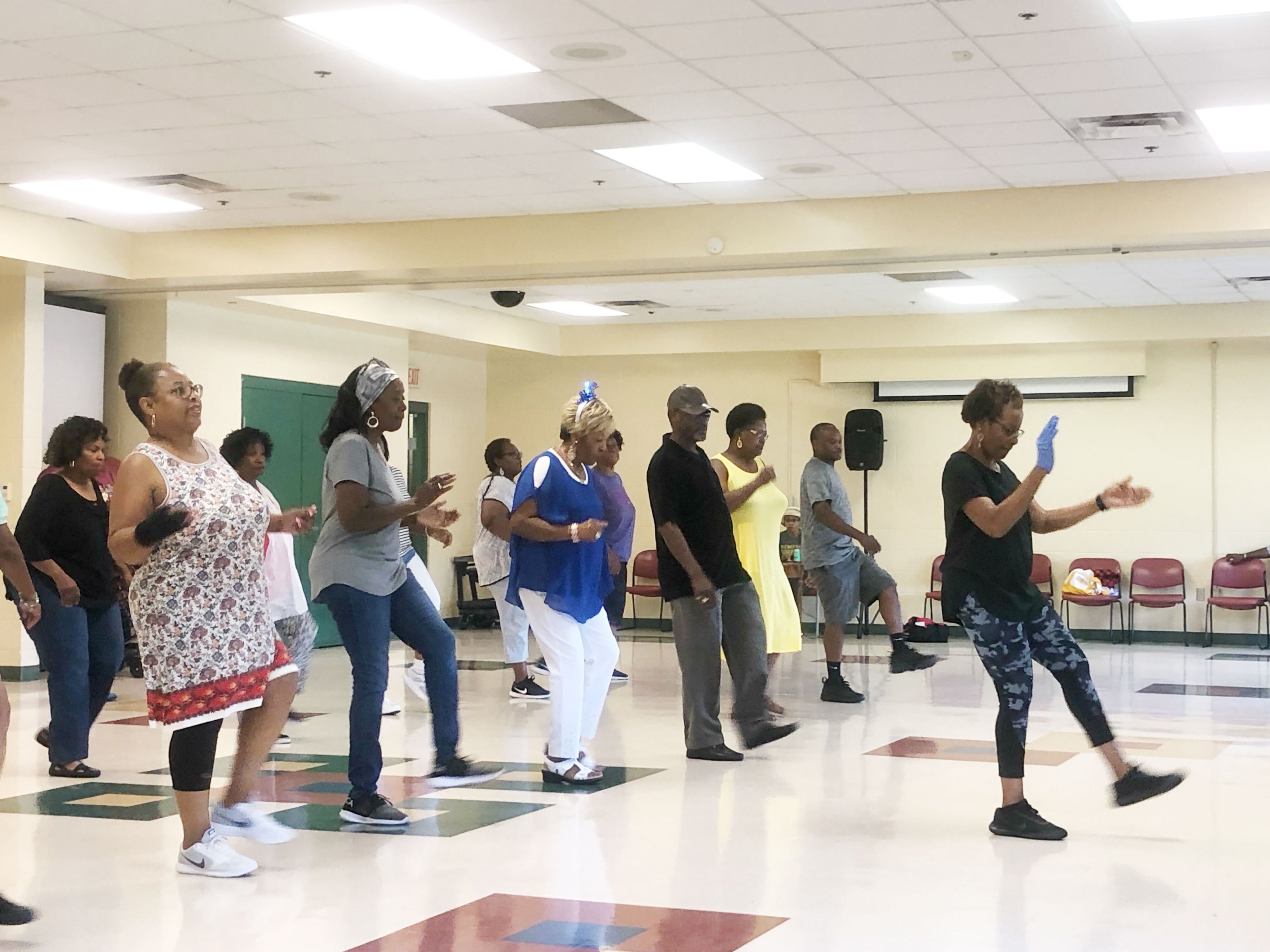Instructor Roxie Jones leads an energetic group of line dancers at the Hickory Hill Community Center's senior line dancing class. (AJ Dugger III)