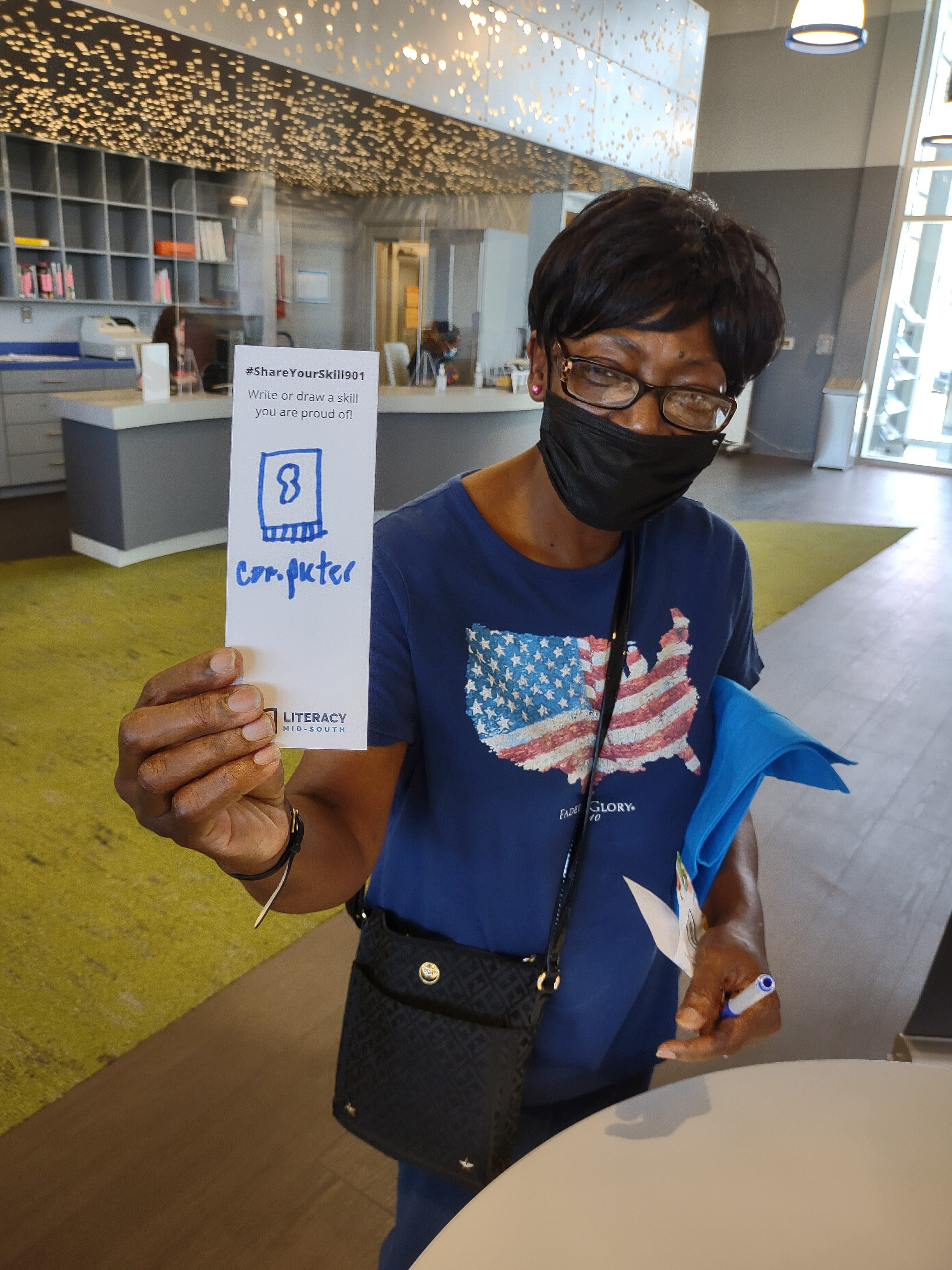 A #ShareYourSkill901 participant shows her written skill on a bookmark. (Photo courtesy of Literacy Mid-South)