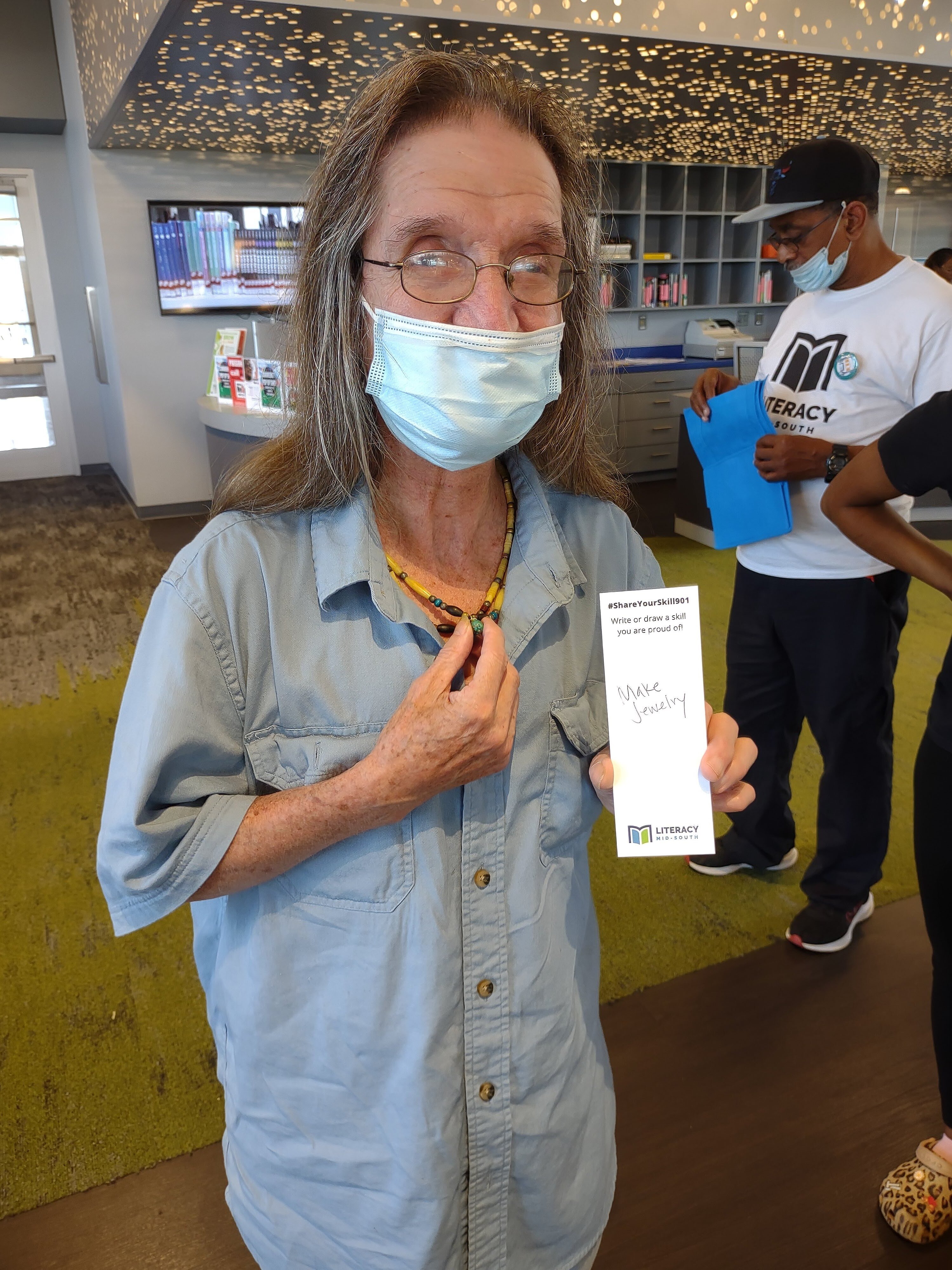 A #ShareYourSkill901 participant shows his written skill at an Eat This Book event at the Raleigh Library. (Photo courtesy of Literacy Mid-South)