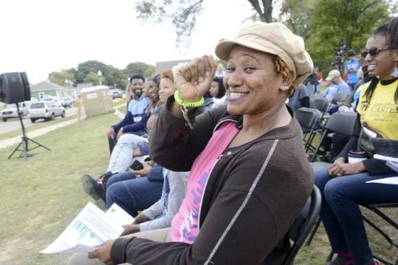 New homebuyer Timeka Seldon shows off the keys to her new home