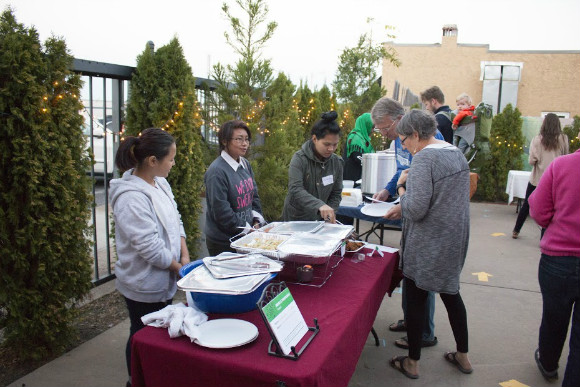 Indra Sunuwar (left) her sister and her friend sell dumplings.