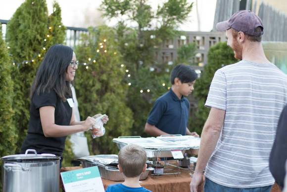 Translator Melissa Garcia helps sell Mexican fare.