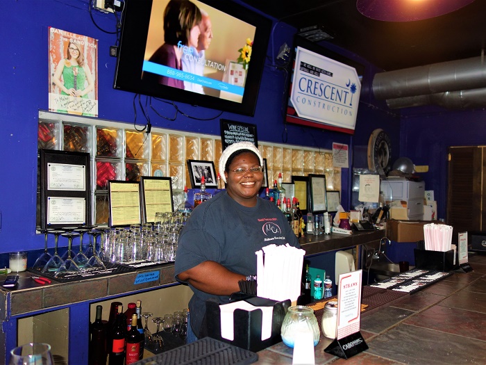 Owner and chef Octavia Young behind the counter at Midtown Crossing Grill.
