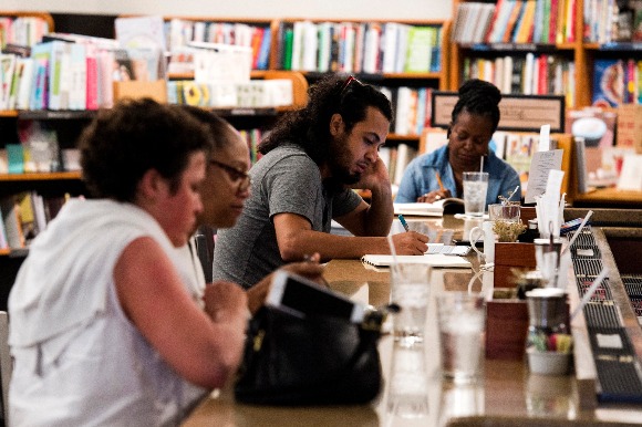 Diners including Carlos Ochoa, second from right, enjoy lunch at Libro restaurant inside Novel bookstore in East Memphis. (Brandon Dill/High Ground News)