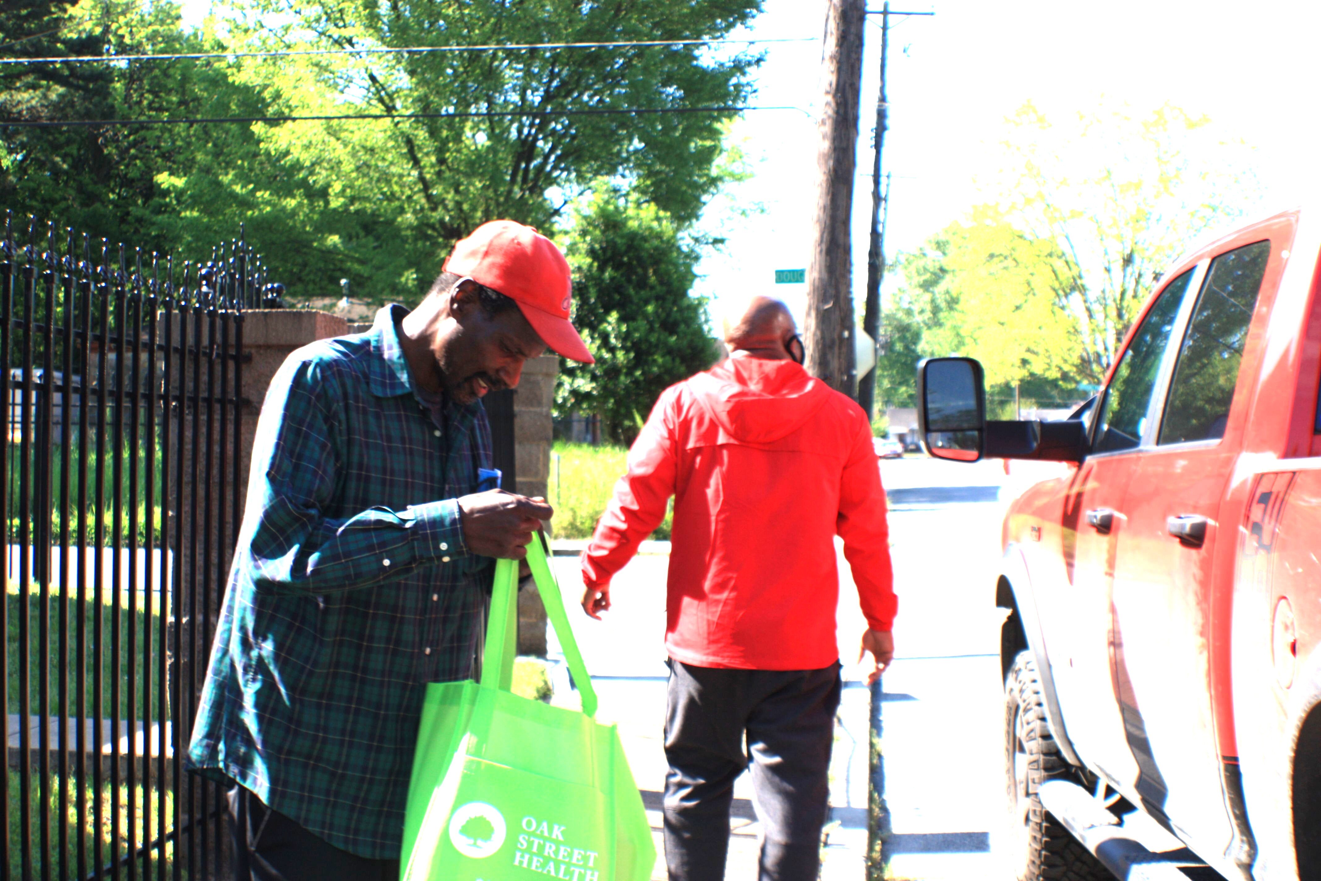 JUICE Orange Mound packed custom care packages for neighbors who use their text-based request system but also packed bags with basic staple items for neighbors they might meet on the streets, like the resident pictured here. (Cole Bradley)