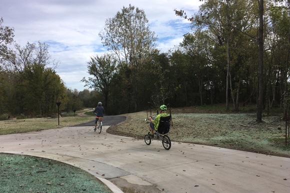The new segment of the Wolf River Greenway has a 1.2-mile paved trail, wide concrete and asphalt paths and a boardwalk.