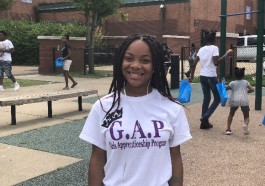 Sixteen year-old Lexus Carter, a recent graduate of the Girls Empowerment Program and one of the rally's nine student organizers, poses for a picture outside of Dave Wells Community Center. (Shelda Edwards)