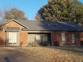 Exterior of a distressed house where Renshaw Rehabs recently did a full interior and exterior rehab