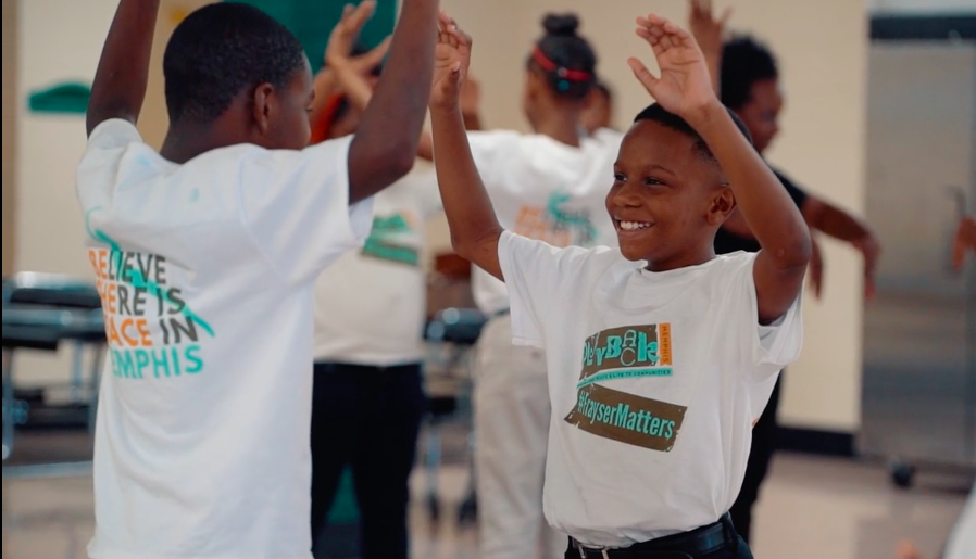 Students at Frayser Elementary learn exercises that promote understanding and emotional stability. (Courtesy Playback Memphis)