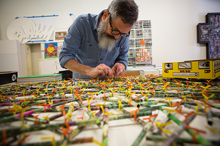 Artist Brantley Ellzey in workspace, as part of "Memphis Studios: A Visual Tour." (Murray Riss)