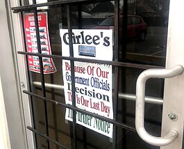A sign on the door of Miss Girlee’s Soul Food Restaurant in North Memphis announces its closure due to the COVID-19 pandemic. (Ashley Davis)