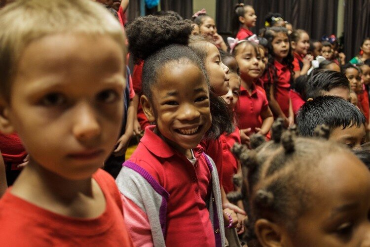 Treadwell Elementary kindergarten students beamed with excitement as they prepared to sing '¿Que ves alli?' at the school's Hispanic Heritage Day celebration. (Renier Otto)