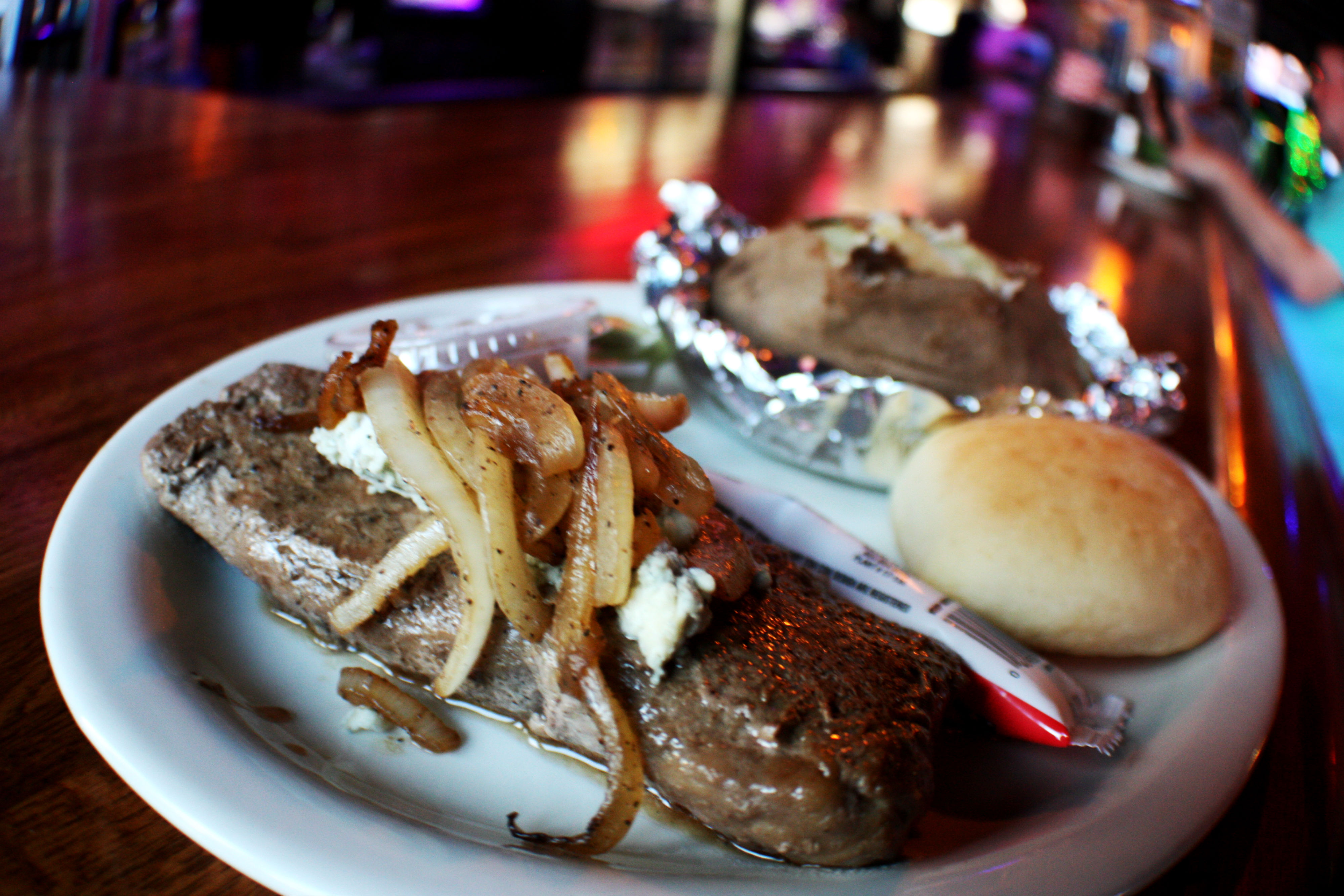 The Pumping Station has remained relevant with themed events and special offers. Wednesday night is steak night. An eight ounce steak topped with grilled onions and blue cheese served with a loaded baked potato and side salad is $15. (Cole Bradley)