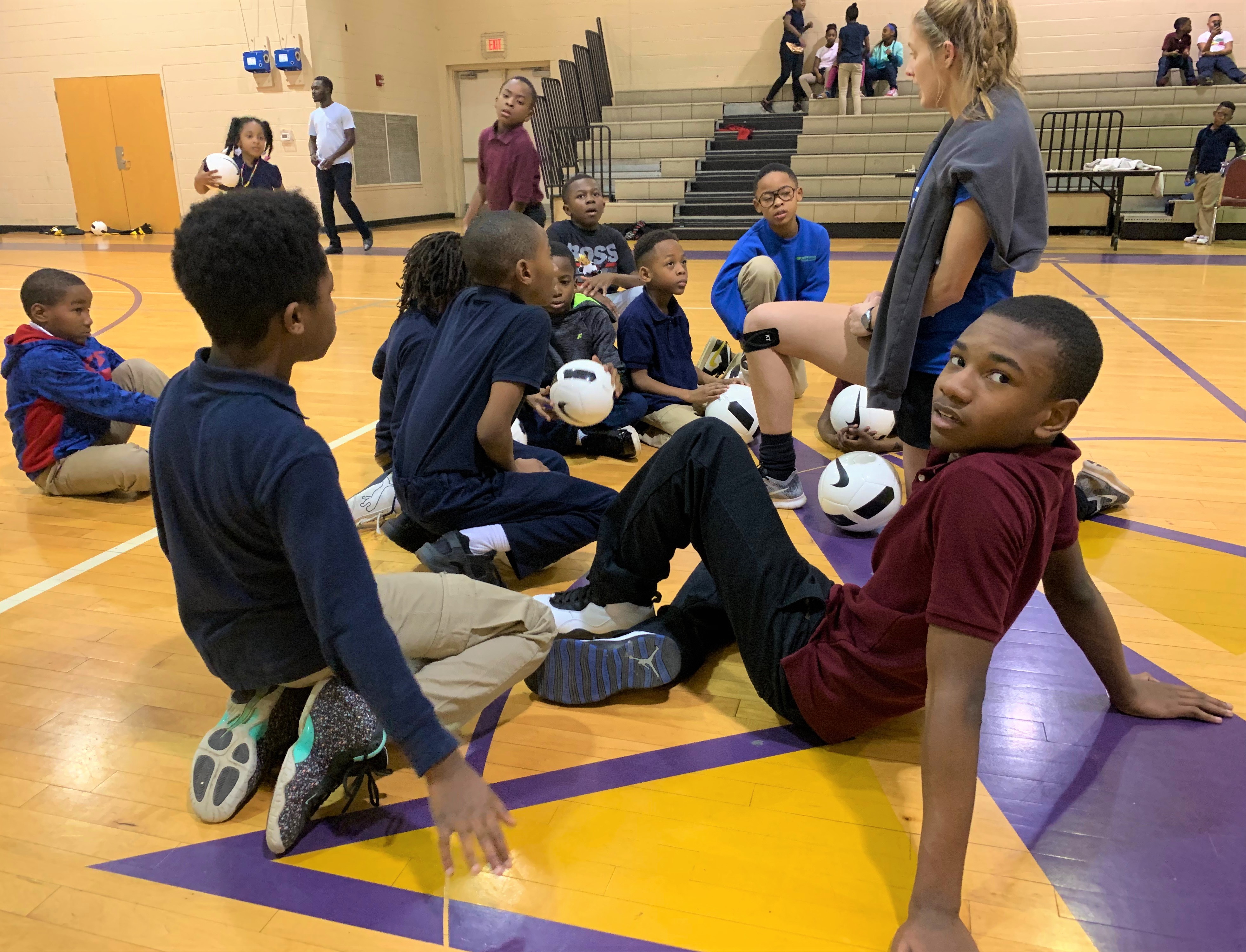 Coach Bailey Tadlock, a sophomore and women's soccer player at Christian Brothers University, coaches children at Play Where You Stay's College Park site, where children in kindergarten through fifth grade gather weekdays after school. (Submitted)